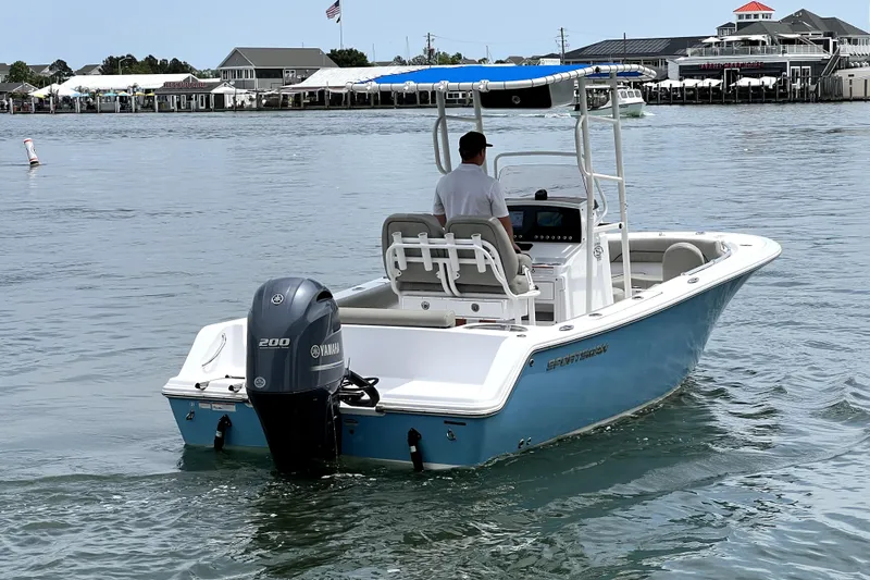 Slide: The Image of 2022 Sportsman Open 212 Center Console boat on water, featuring Yamaha 200 engine. - 4