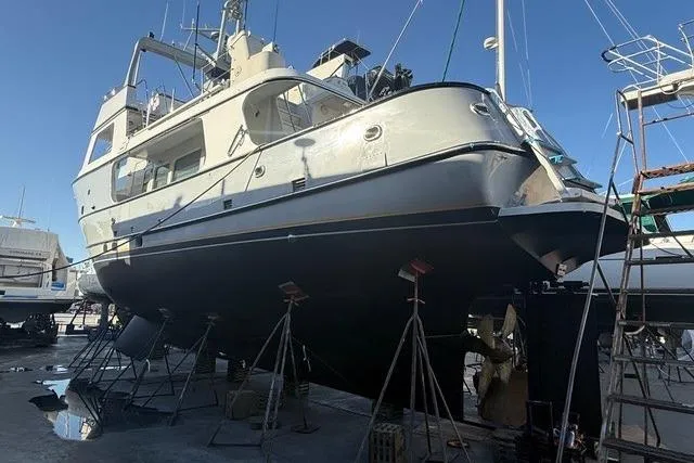 Slide: The Image of 1990 Seaton Long Range Cruiser yacht on dry dock for maintenance. - 37