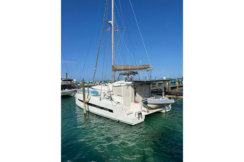 The Image of Sailing catamaran Bali 4.1, 2018 model, docked in a marina under clear blue skies. - 1