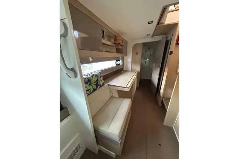 Slide: The Image of Interior of 2018 Bali 4.1 yacht, featuring seating and modern cabinetry. - 14