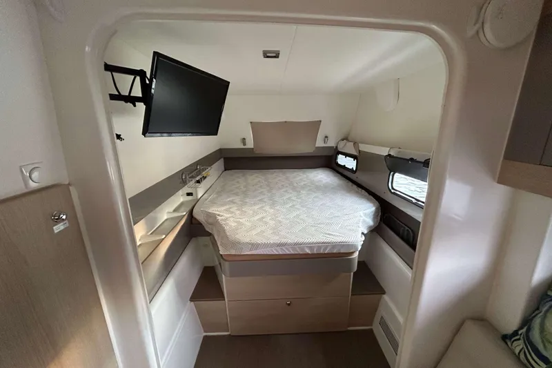 Slide: The Image of Compact bedroom in 2018 Bali 4.1 yacht with bed, TV, and windows. - 15