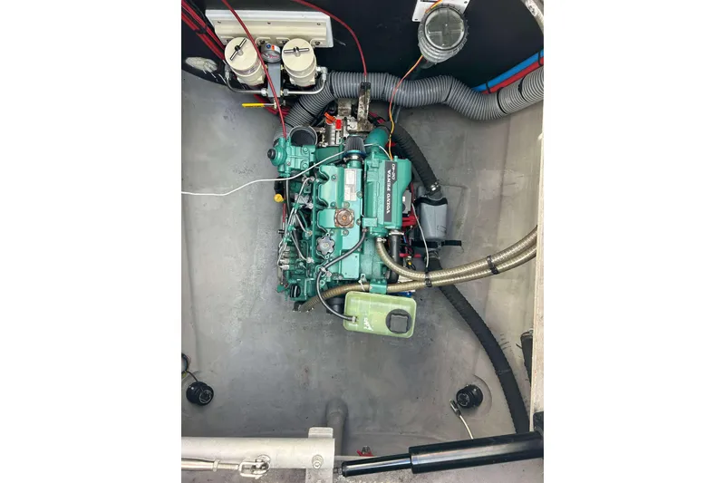 Slide: The Image of Engine compartment of a 2018 Bali 4.1 boat, featuring a Volvo Penta engine. - 19