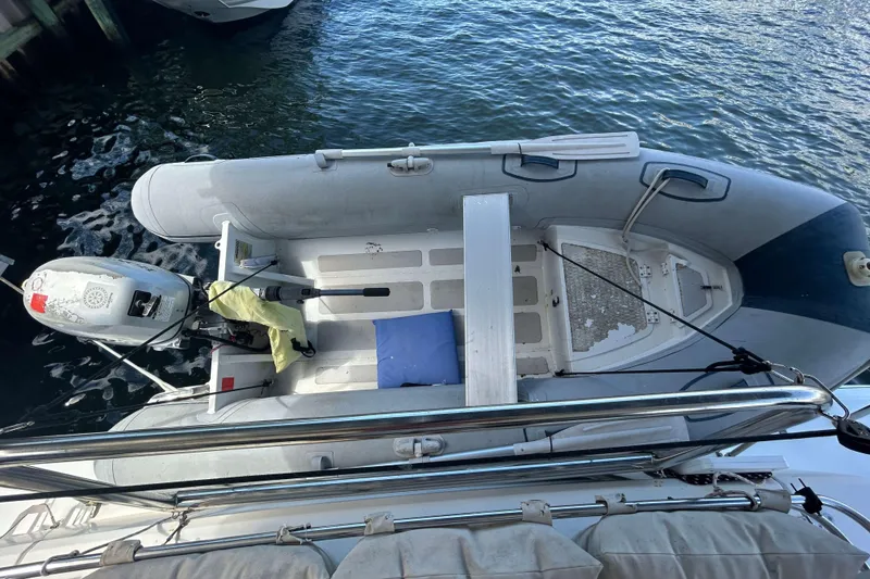 Slide: The Image of Inflatable boat with outboard motor on water, Bali 4.1 model, 2018. - 6