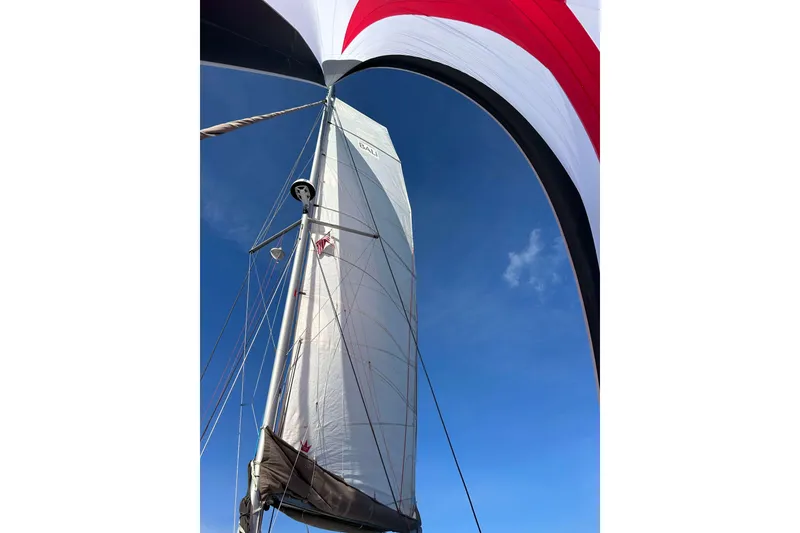 Slide: The Image of Sailboat mast and sail against clear blue sky, Bali 4.1 model, 2018. - 7