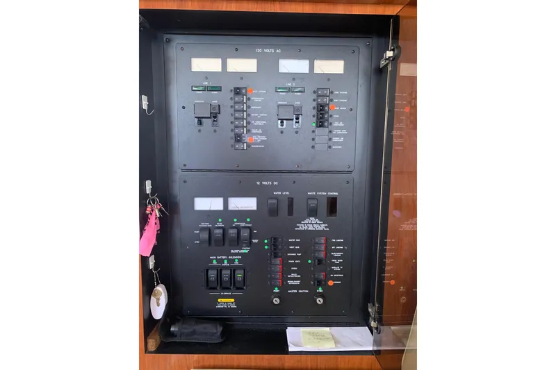 Slide: The Image of Electrical control panel on a 2004 Sea Ray 420 Sedan Bridge yacht. - 27