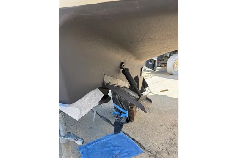 Slide: The Image of 2004 Sea Ray 420 Sedan Bridge hull detail during maintenance on dry dock. - 81