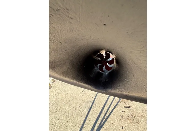 Slide: The Image of Close-up of a 2004 Sea Ray 420 Sedan Bridge bow thruster tunnel. - 97