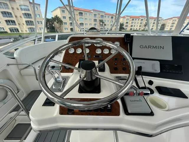 Slide: The Image of Helm of a 2003 Silverton 42 Convertible yacht. - 22