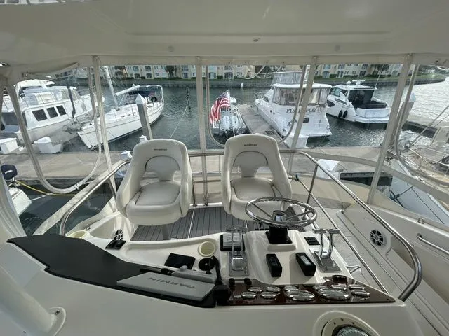 Slide: The Image of Interior view of 2003 Silverton 42 Convertible yacht in harbor. - 26