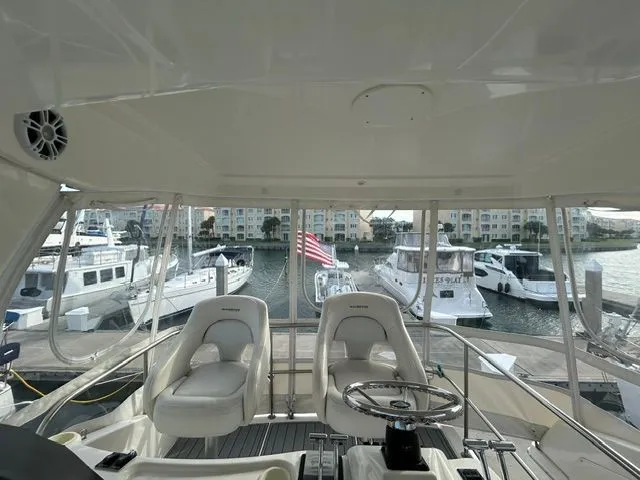 Slide: The Image of Interior view of Silverton 42 Convertible yacht in harbor. - 27