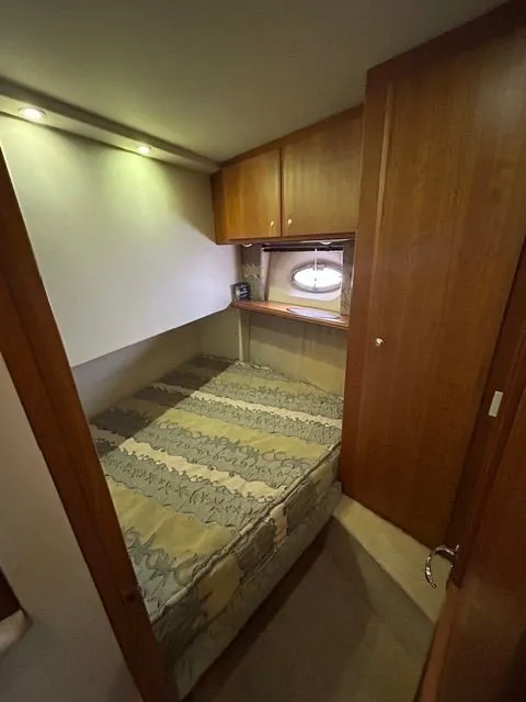 Slide: The Image of Interior of 2003 Silverton 42 Convertible yacht cabin. - 40