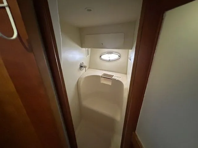 Slide: The Image of Shower area in 2003 Silverton 42 Convertible boat. - 45