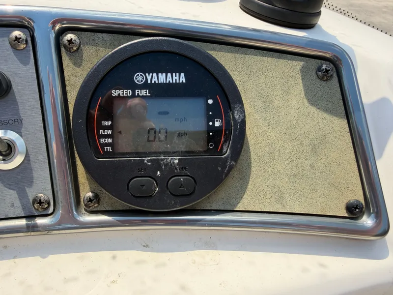 Slide: The Image of Yamaha speed and fuel gauge on Scout 177 Sport boat. - 10