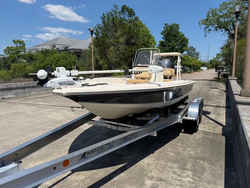 Slide: The Image of 2019 Scout 177 Sport boat on trailer outdoors. - 3