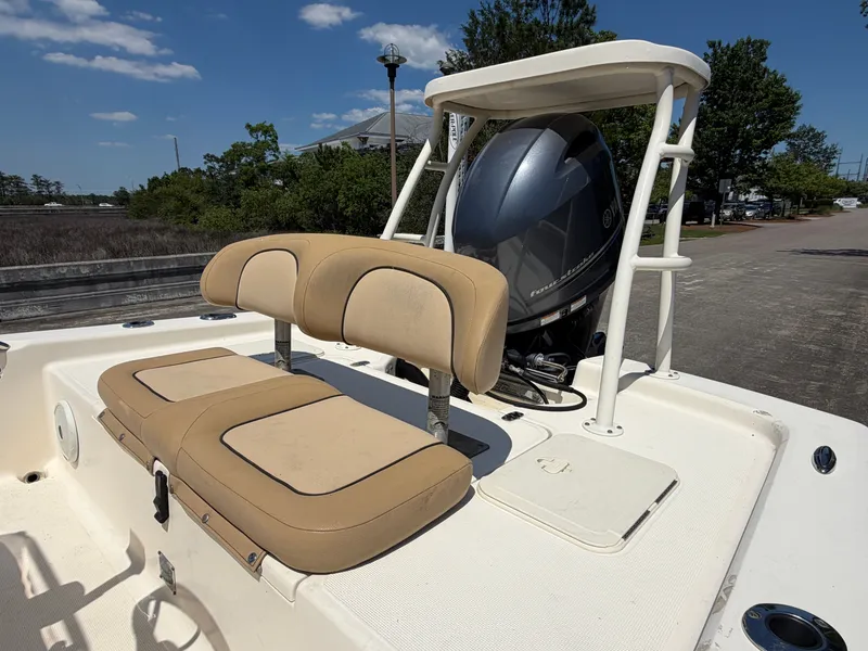 Slide: The Image of Scout 177 Sport 2019 with outboard motor and seating bench. - 5