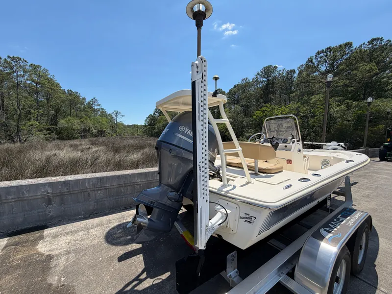 Slide: The Image of 2019 Scout 177 Sport boat on a trailer. - 7
