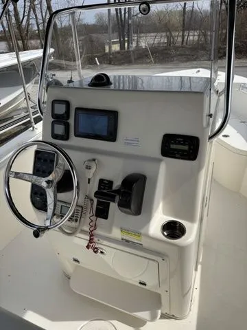 Slide: The Image of 2015 Cobia 201 Center Console helm with electronics. - 12