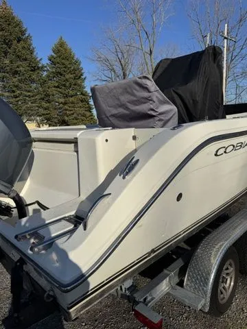 Slide: The Image of 2015 Cobia 201 Center Console boat on trailer. - 14