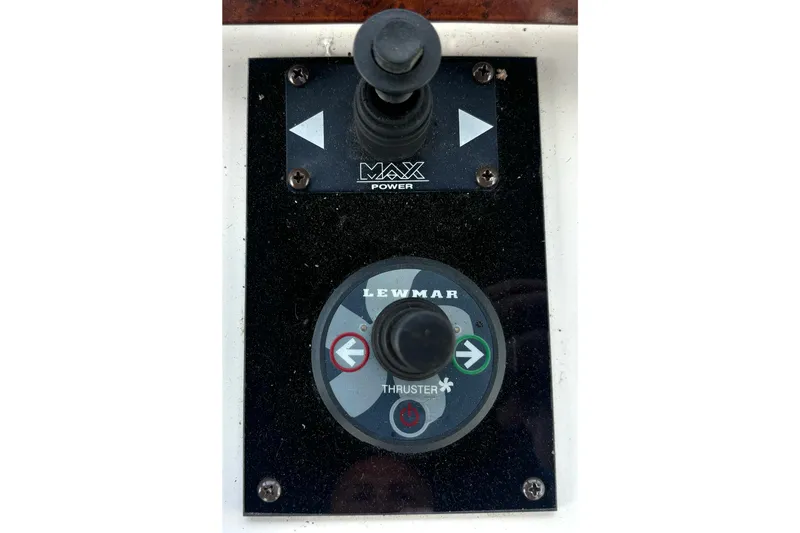 Slide: The Image of Control panel of a 1999 Silverton 453 Motor Yacht with Lewmar thruster joystick. - 26