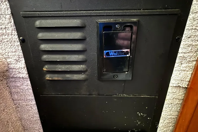 Slide: The Image of Wall-mounted vacuum system on a 1999 Silverton 453 Motor Yacht. - 64