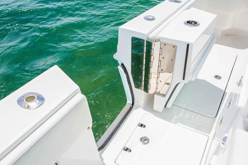 Slide: The Image of Manufacturer Provided Image: 2019 Concept 392 ProFish boat with open transom door on the water. - 11
