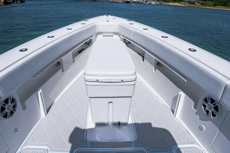 Slide: The Image of 2019 Concept 392 ProFish boat deck with seating, speakers, and ocean view. - 13