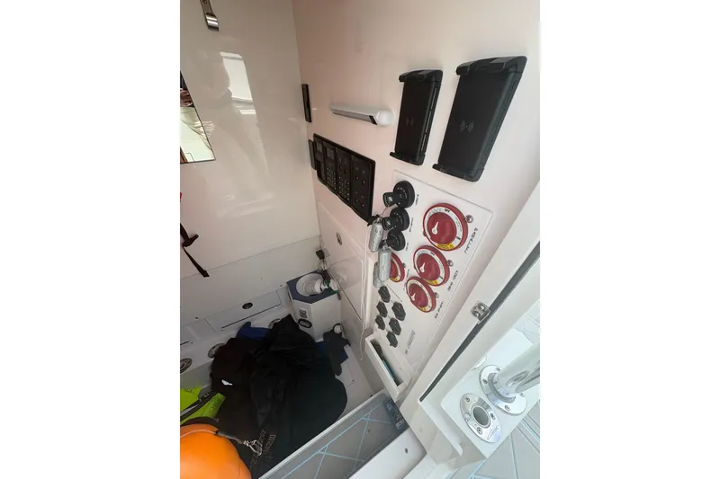 Slide: The Image of Interior view of 2019 Concept 392 ProFish boat with control panels and equipment. - 15