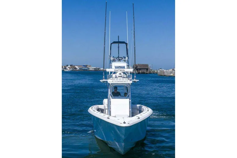 Slide: The Image of 2019 Concept 392 ProFish boat on water, featuring sleek design and advanced fishing equipment. - 2