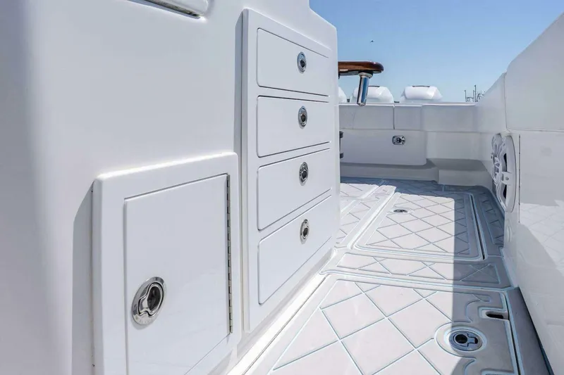 Slide: The Image of 2019 Concept 392 ProFish boat interior with storage compartments and sleek design. - 34