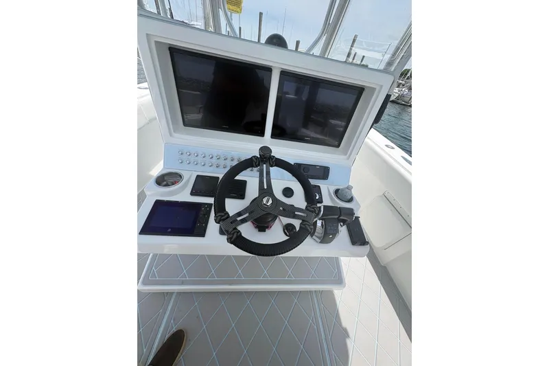 Slide: The Image of Control panel of 2019 Concept 392 ProFish boat with dual screens and steering wheel. - 43