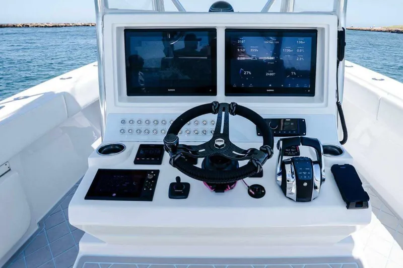 Slide: The Image of Control panel of 2019 Concept 392 ProFish boat with advanced navigation displays. - 53