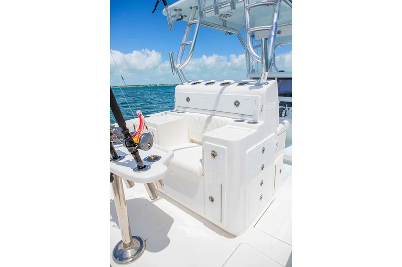 Slide: The Image of Manufacturer Provided Image: 2019 Concept 392 ProFish boat seating and fishing rod holders. - 8