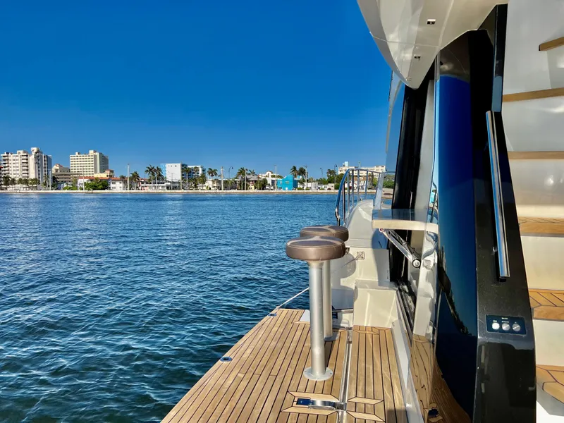 Slide: The Image of 2022 Galeon 470 Sky yacht with waterfront city view. - 15