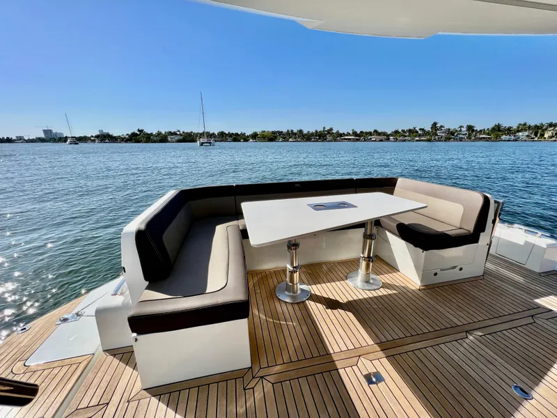 Slide: The Image of Luxury seating area on the 2022 Galeon 470 Sky yacht with ocean view. - 18