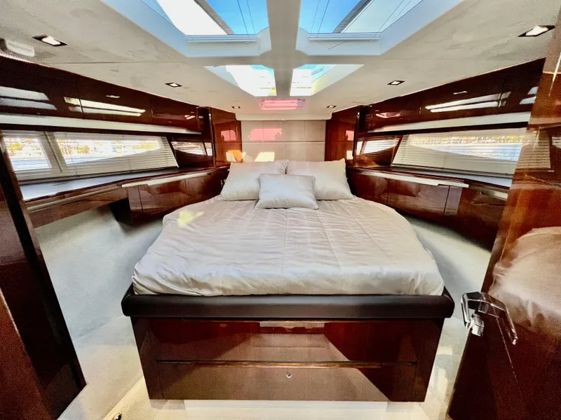 Slide: The Image of Luxurious master cabin of 2022 Galeon 470 Sky yacht with skylights and modern design. - 29