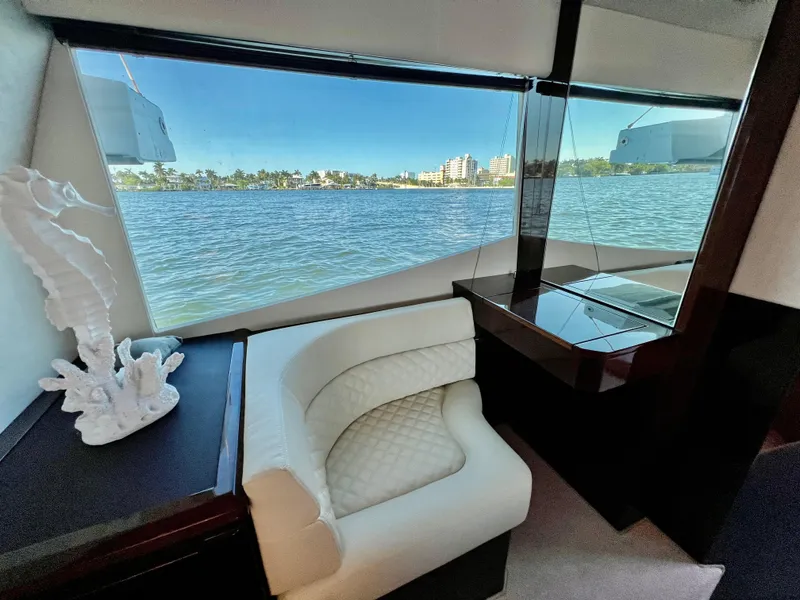 Slide: The Image of Interior view of 2022 Galeon 470 Sky yacht with waterfront scenery. - 33