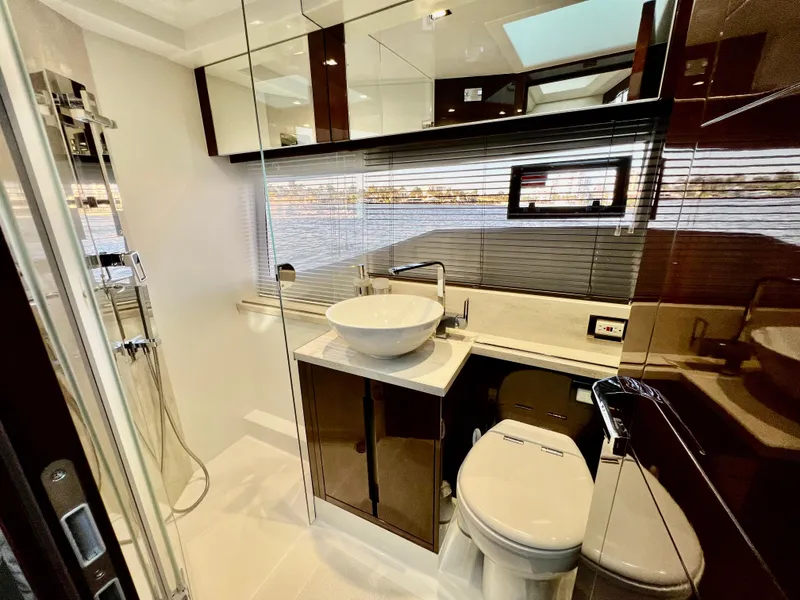 Slide: The Image of Luxurious bathroom in the 2022 Galeon 470 Sky yacht with modern fixtures and sleek design. - 35
