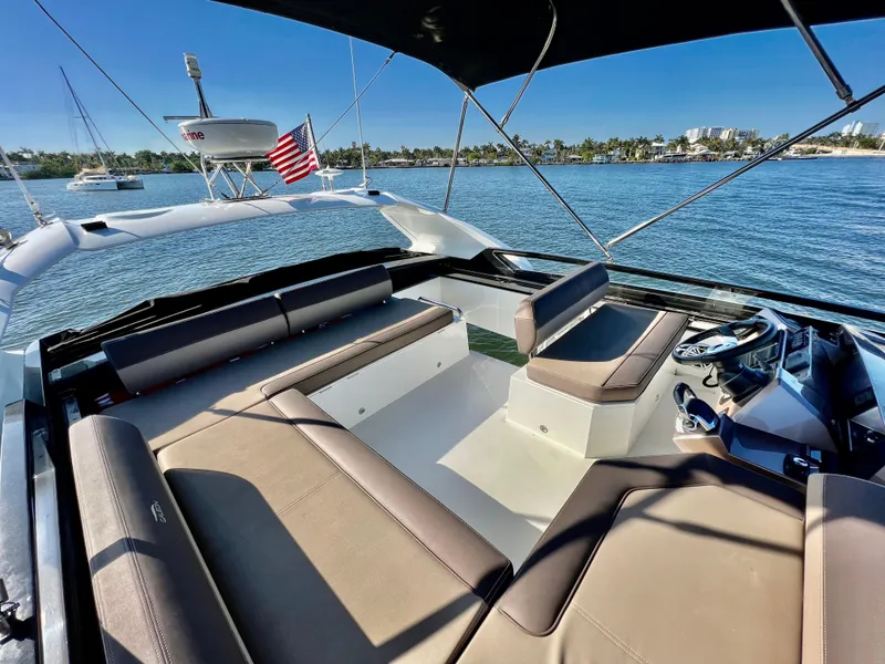 Slide: The Image of 2022 Galeon 470 Sky yacht with spacious seating area and scenic water view. - 8