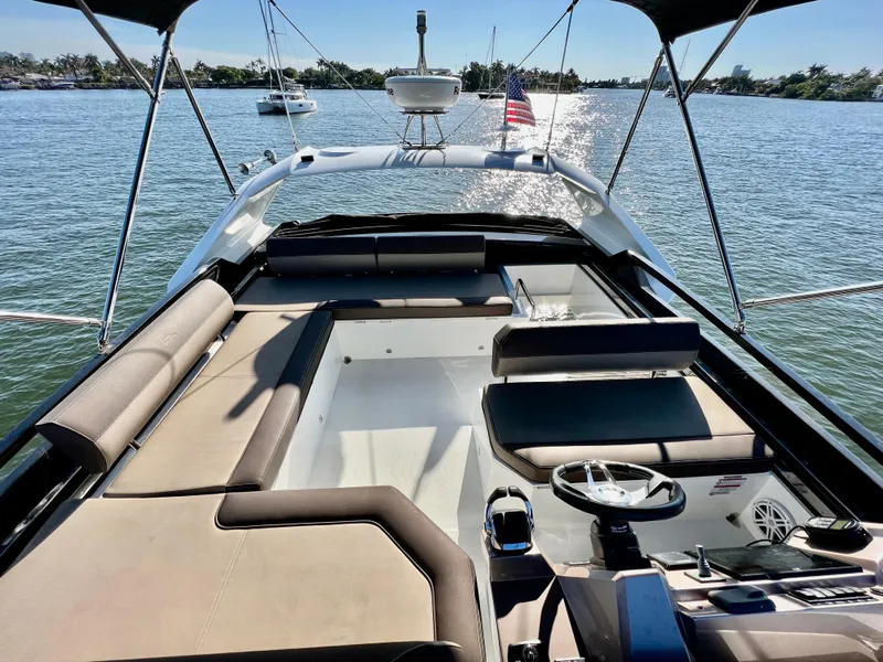 Slide: The Image of 2022 Galeon 470 Sky yacht with spacious deck and seating on a sunny day. - 9