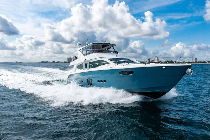 Slide: The Image of Luxurious 2013 Custom 73 Lanzarote yacht cruising on open water under a cloudy sky. - 1