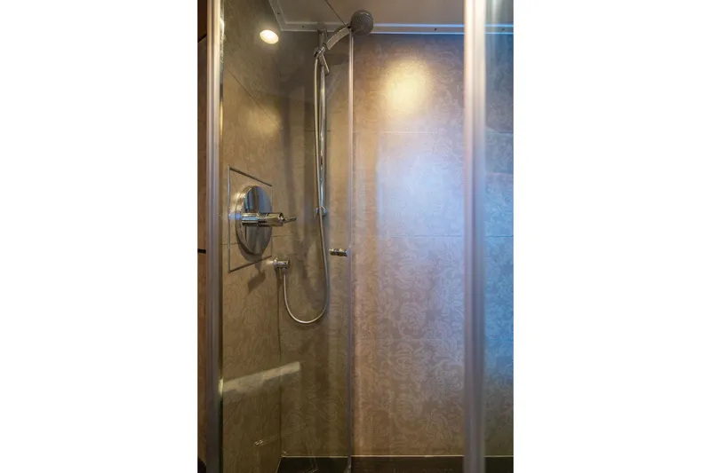 Slide: The Image of Modern shower with elegant tile design and chrome fixtures, Custom 73 Lanzarote model, 2013. - 100