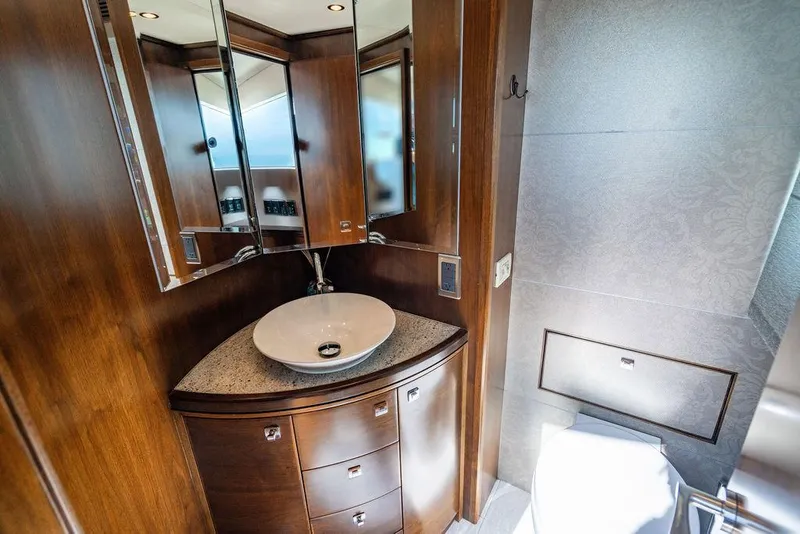Slide: The Image of Luxurious yacht bathroom with elegant wood cabinetry and modern vessel sink, 2013 Custom 73 Lanzarote. - 103