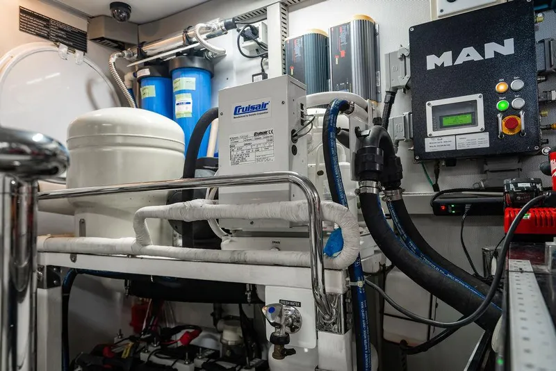Slide: The Image of Engine room of 2013 Custom 73 Lanzarote yacht with MAN control panel and Cruisair system. - 113