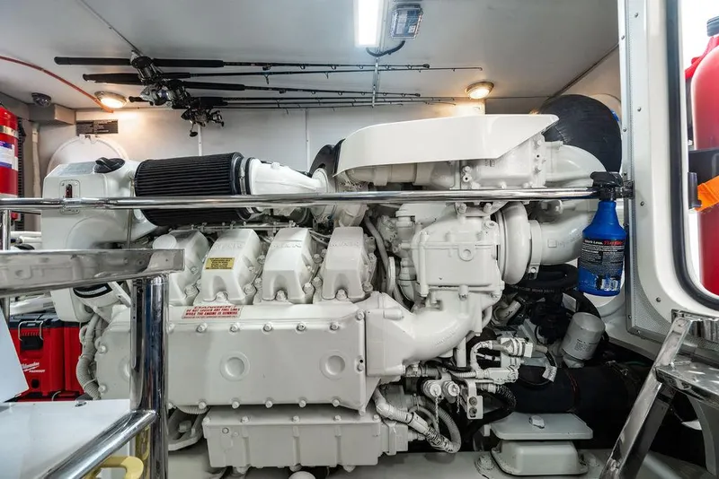 Slide: The Image of Engine room of 2013 Custom 73 Lanzarote yacht, featuring a large white engine. - 114