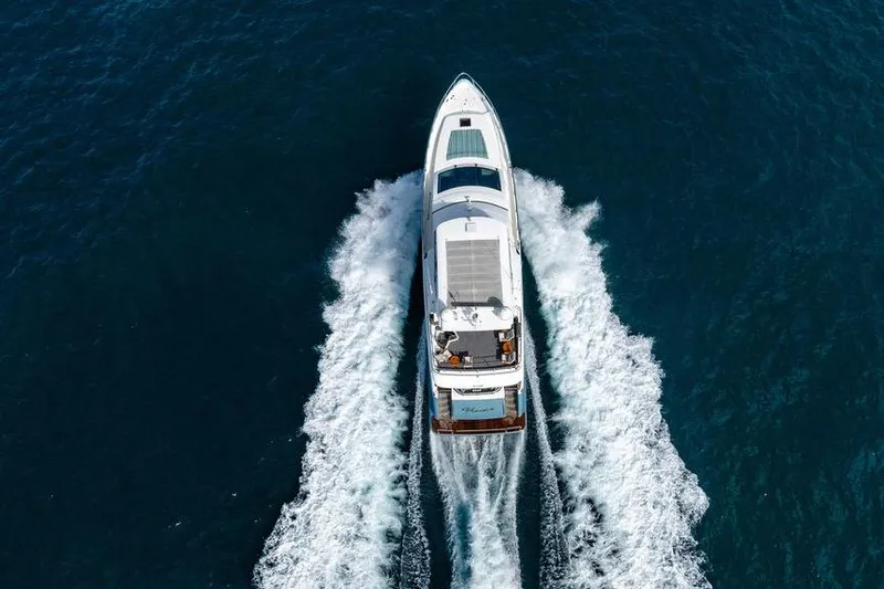Slide: The Image of Aerial view of 2013 Custom 73 Lanzarote yacht cruising on blue ocean waters. - 12