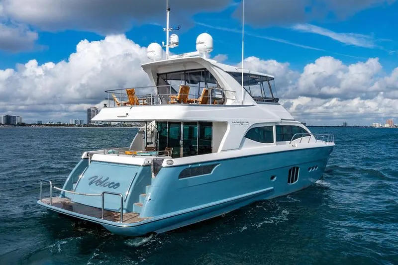 Slide: The Image of Luxurious 2013 Custom 73 Lanzarote yacht cruising on open water under a cloudy sky. - 2