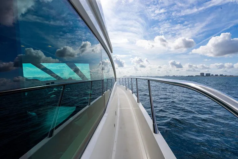 Slide: The Image of Custom 73 Lanzarote yacht cruising on open sea under a partly cloudy sky, 2013 model. - 22