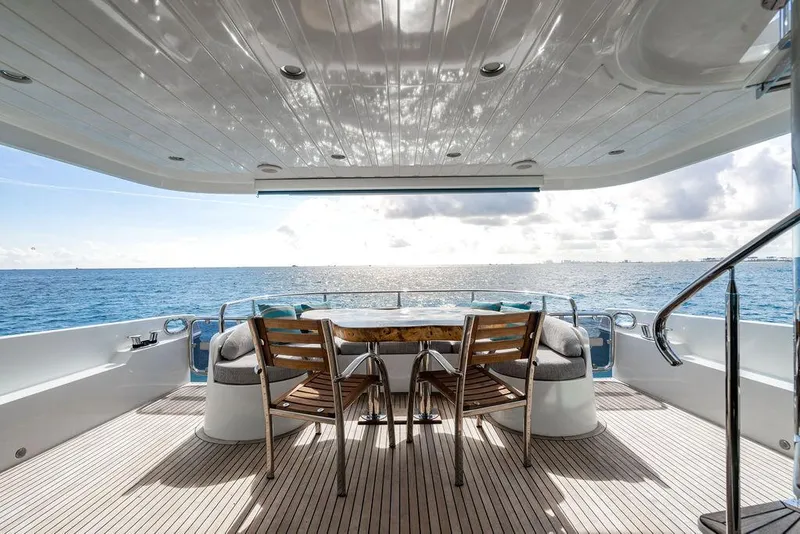 Slide: The Image of Luxury yacht deck with seating, ocean view, and wooden table on 2013 Custom 73 Lanzarote. - 26