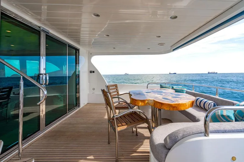 Slide: The Image of Luxurious yacht deck with wooden table, chairs, and ocean view, Custom 73 Lanzarote, 2013. - 27