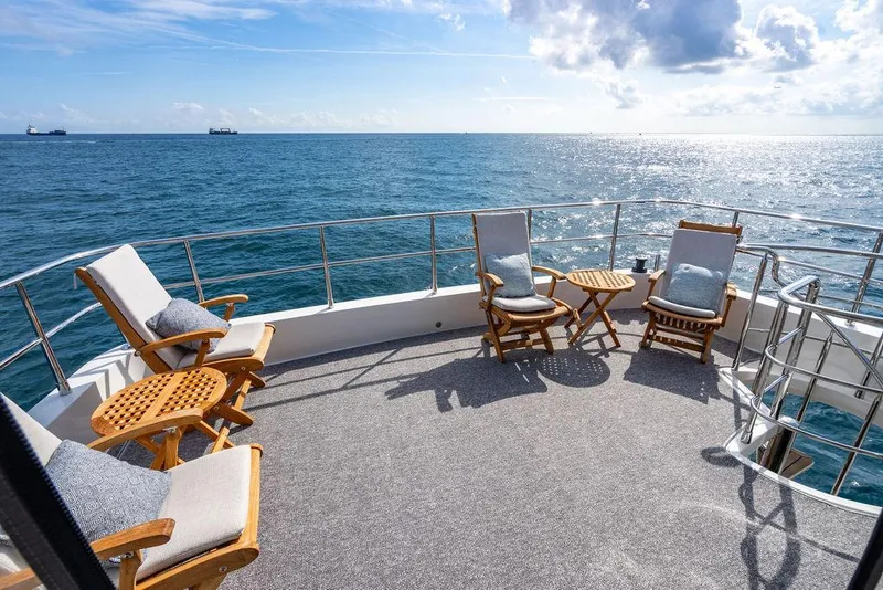 Slide: The Image of Luxurious deck of 2013 Custom 73 Lanzarote yacht with ocean view and comfortable seating. - 32